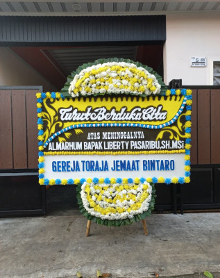 Papan Bunga Duka di Welesi